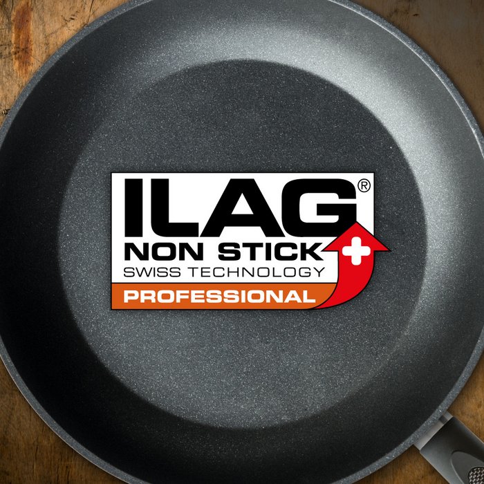 Black and with little flitter coated inside of a frying pan - ILAG logo with orange shaded Professional lettering in the center