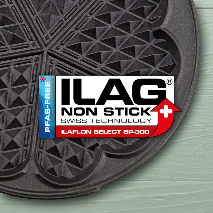 Schwarz beschichtetes Eisen für Herz-Waffeln - mittig das ILAG Logo mit rot unterlegtem Ilaflon Select SP-300 Schriftzug und links zusätzlicher Beschriftung "PFAS-free" in blau