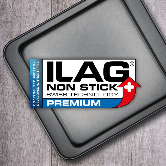 Black coated inside of a quare baking tray - ILAG logo with blue shaded Premium lettering in the center and on the left hand side an extra labeling "PFAS-FREE" in blue